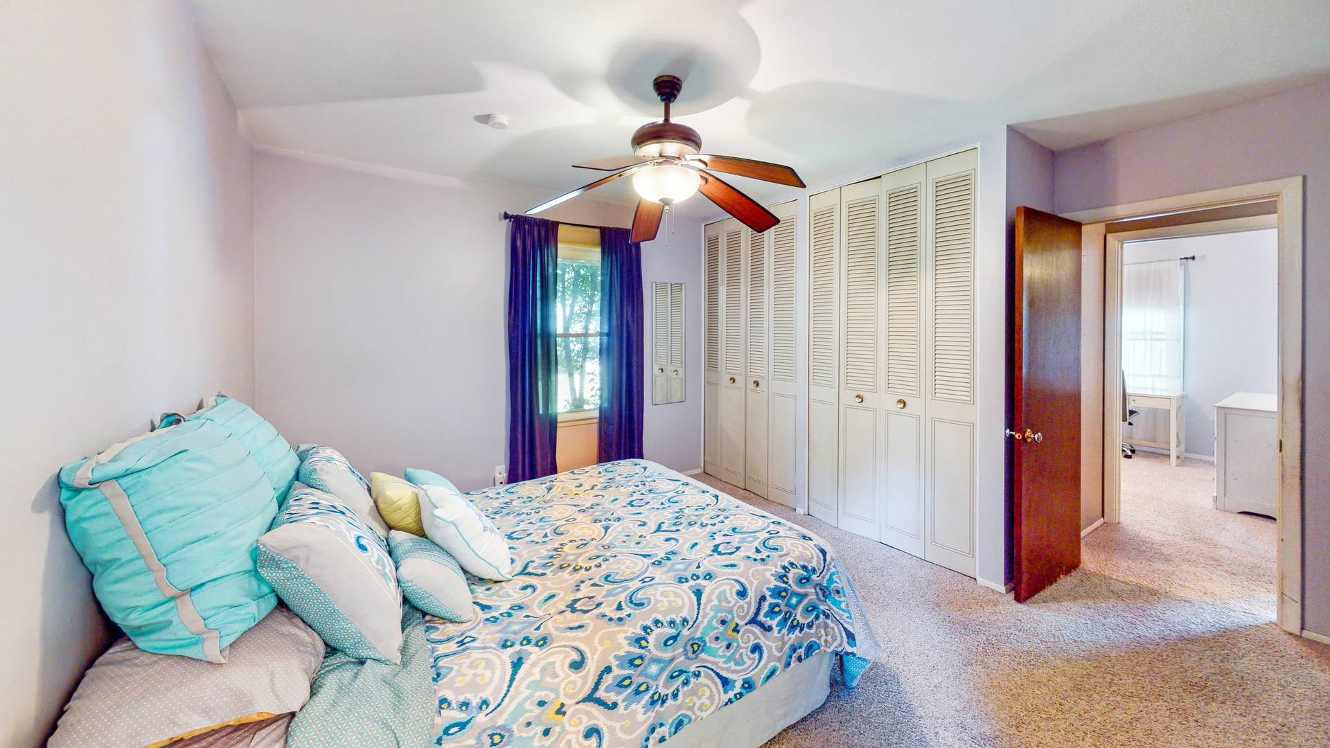 44 Aldon Road Montgomery, IL 60538 - Photo 17 of 24 a bedroom with a bed and a chandelier