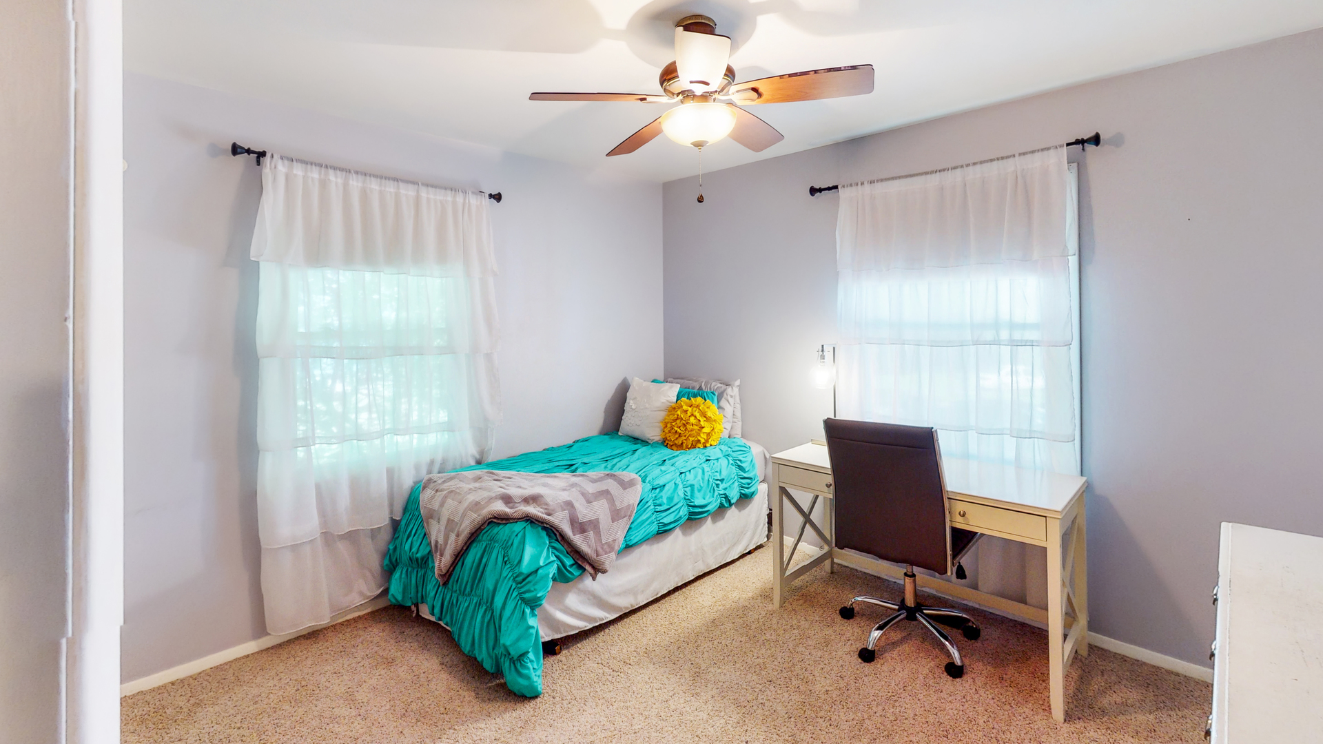 44 Aldon Road Montgomery, IL 60538 - Photo 19 of 24 a bedroom with a bed a desk and chair