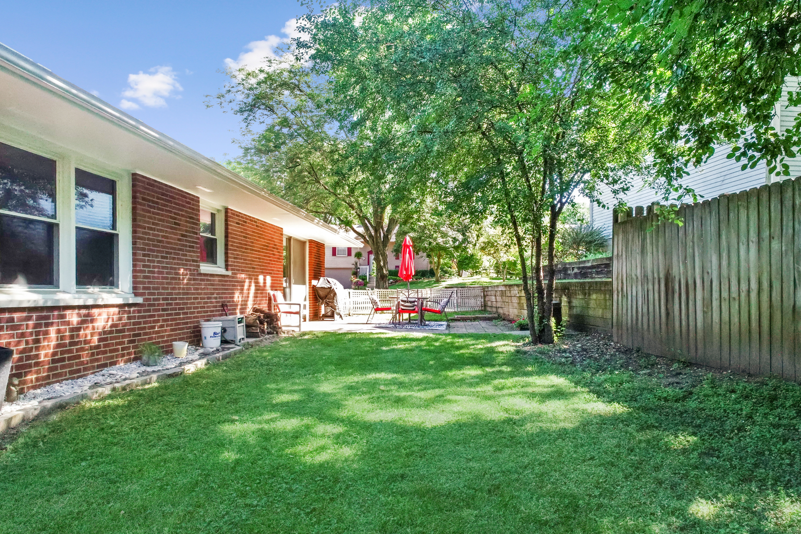 44 Aldon Road Montgomery, IL 60538 - Photo 21 of 24 a front view of a house with backyard and sitting area