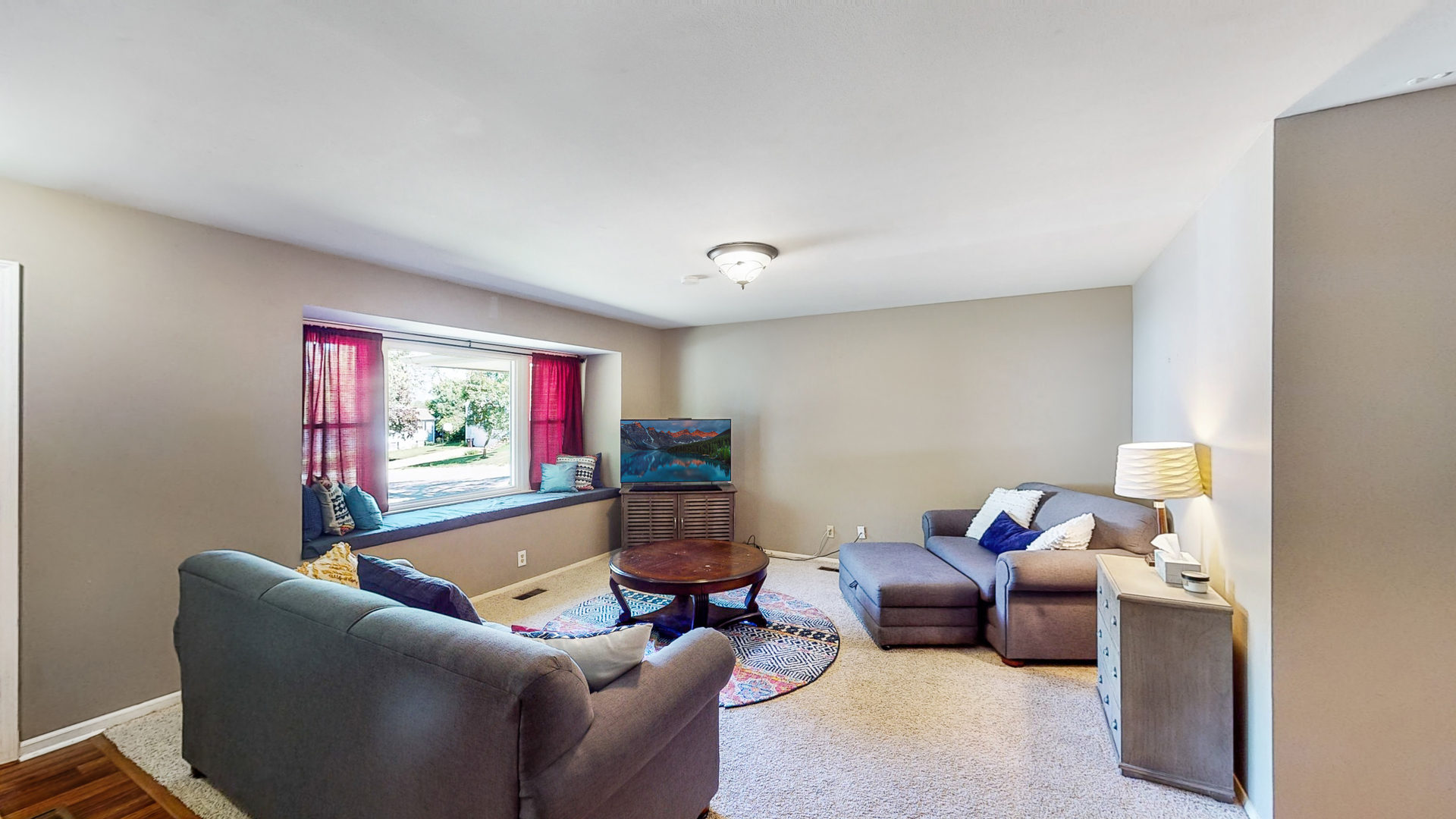 44 Aldon Road Montgomery, IL 60538 - Photo 4 of 24 a living room with furniture and a flat screen tv