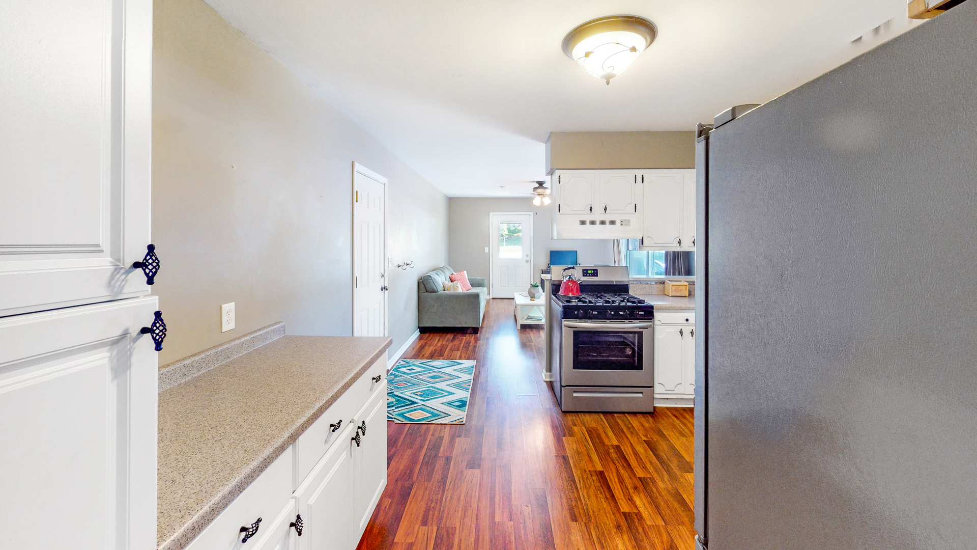 44 Aldon Road Montgomery, IL 60538 - Photo 7 of 24 a kitchen with sink refrigerator and stove