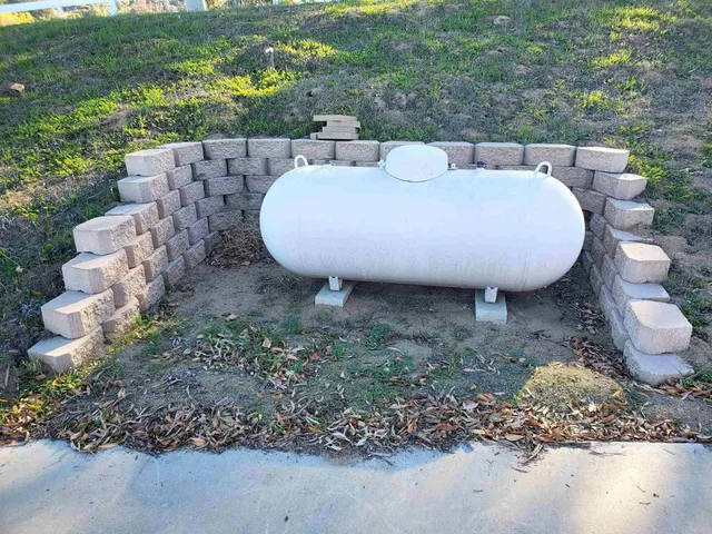 a view of a swimming pool with chairs