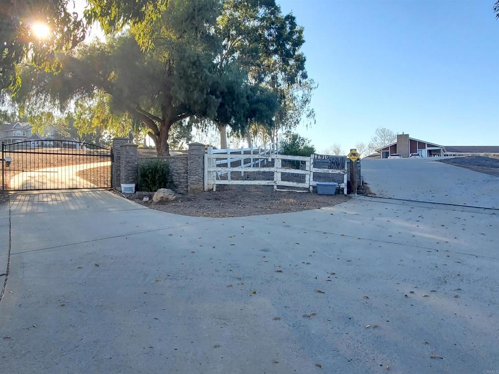 17910 Bluegrass Road Ramona, CA 92065 - Photo 23 of 33 a view of a house with a yard and tree s