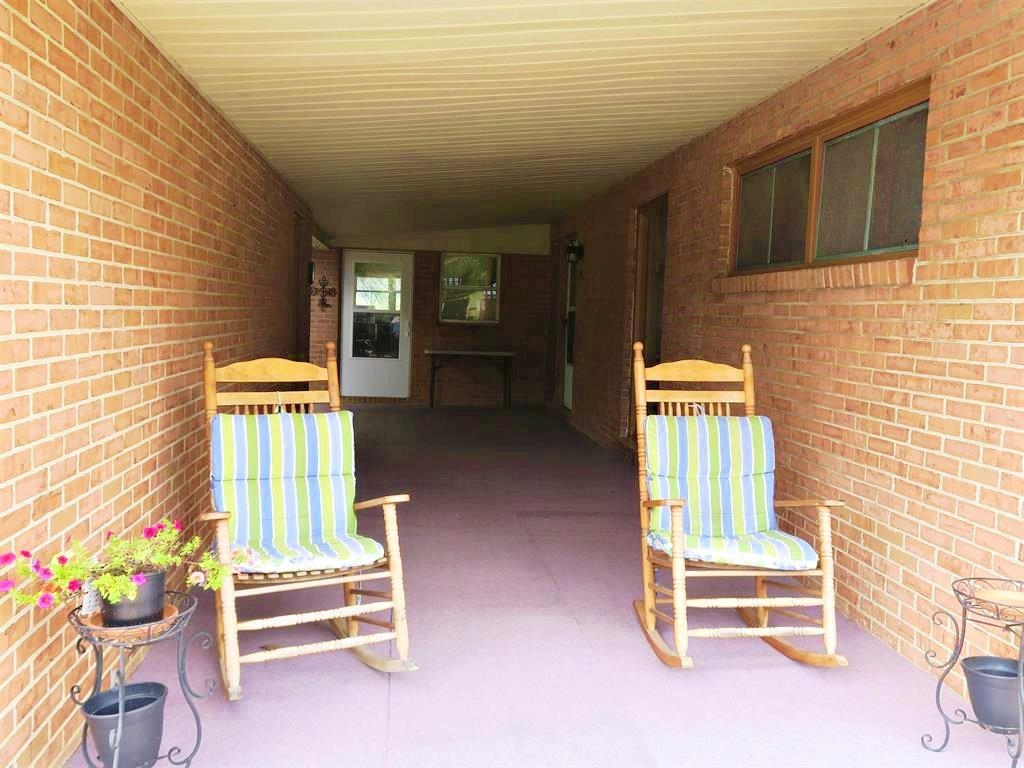 420 Cattle Scales Road Waynesboro, VA 22980 - Photo 4 of 43 a front view of a house with outdoor seating
