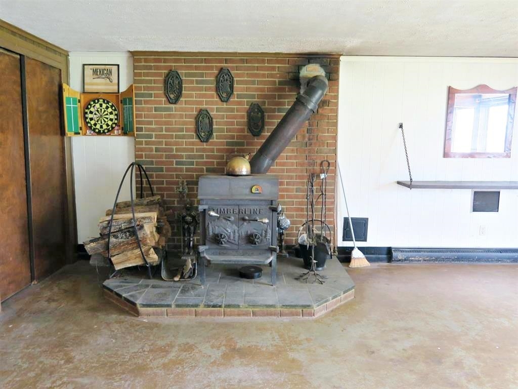 420 Cattle Scales Road Waynesboro, VA 22980 - Photo 42 of 43 a view of a livingroom with furniture and a floor to ceiling window