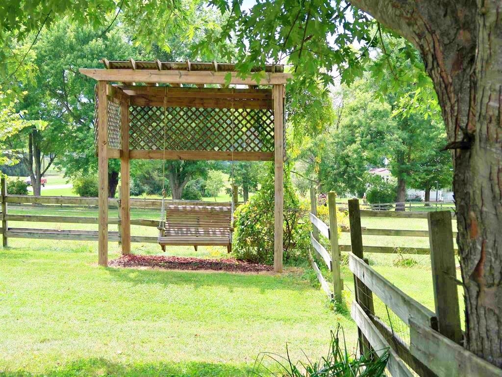 420 Cattle Scales Road Waynesboro, VA 22980 - Photo 8 of 43 a view of a deck with a big yard potted plants and large tree