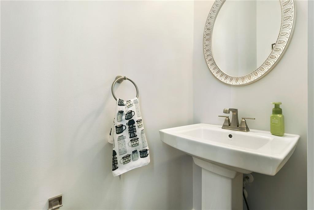 4302 Spruce Road Gibsonia, PA 15044 - Photo 12 of 24 a bathroom with a sink and a mirror