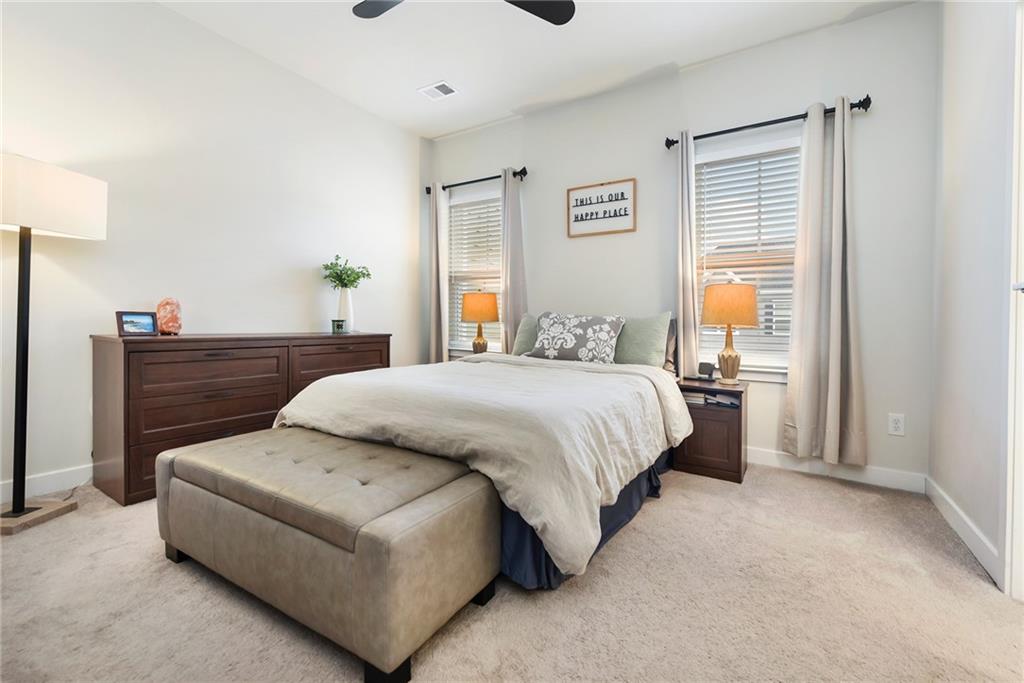 4302 Spruce Road Gibsonia, PA 15044 - Photo 13 of 24 a bedroom with a bed and wooden floor