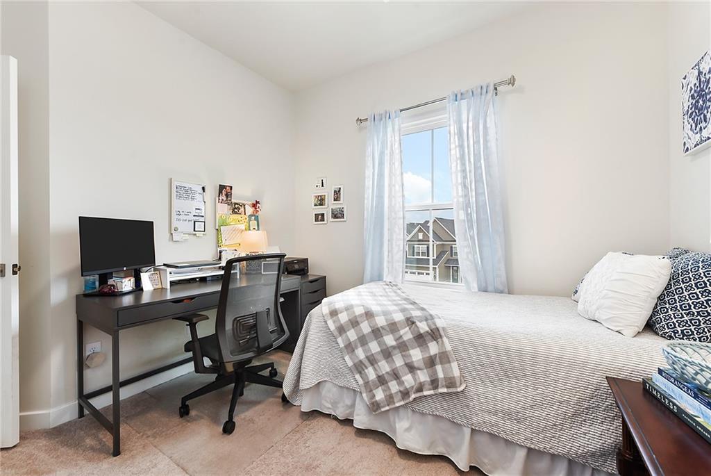 4302 Spruce Road Gibsonia, PA 15044 - Photo 17 of 24 a bedroom with a bed and a desk