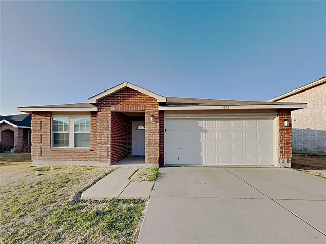 a front view of house with yard