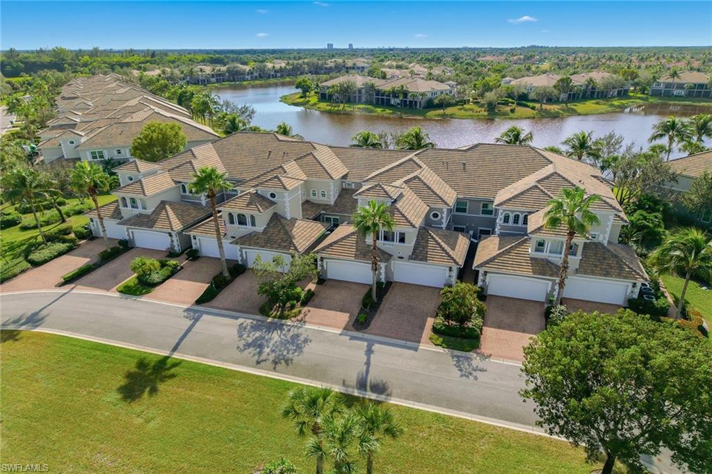9233 Museo Circle, Unit 103 Naples, FL 34114 - Photo 27 of 49 an aerial view of residential house with outdoor space and lake view