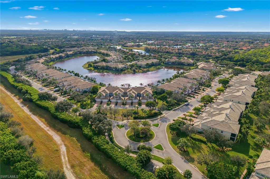 9233 Museo Circle, Unit 103 Naples, FL 34114 - Photo 28 of 49 an aerial view of residential houses with outdoor space