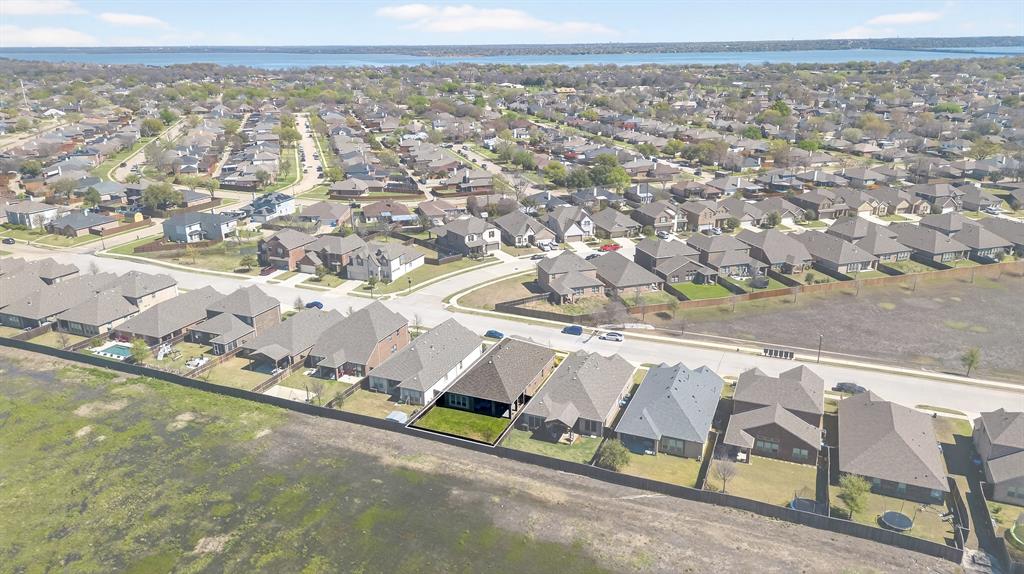 6829 Danridge Road Rowlett, TX 75089 - Photo 25 of 28 an aerial view of residential houses with outdoor space