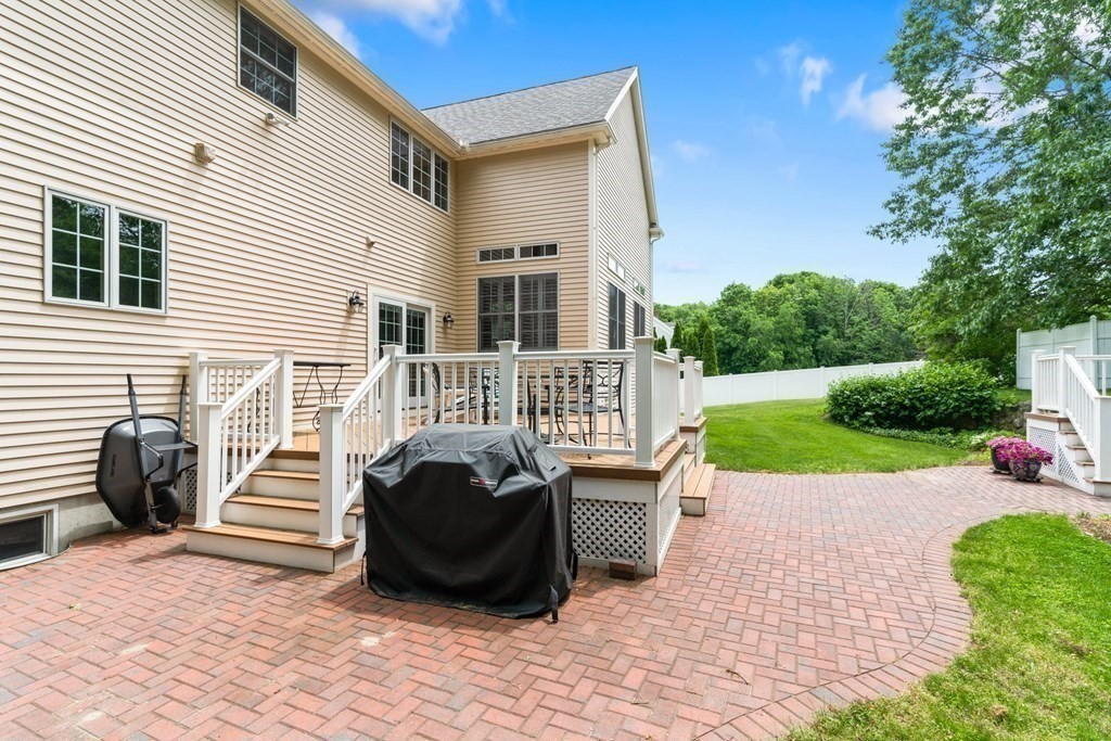 8 Boutwell Road Andover, MA 01810 - Photo 40 of 42 a front view of a house with a yard