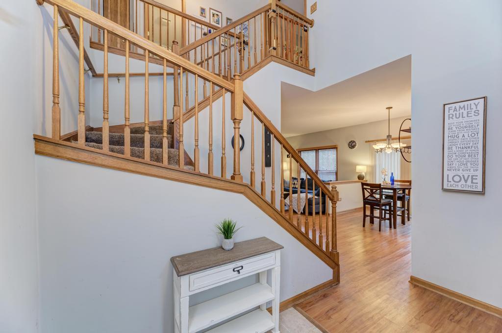 460 Springwood Lane Bolingbrook, IL 60440 - Photo 3 of 35 a view of entryway and hall with wooden floor