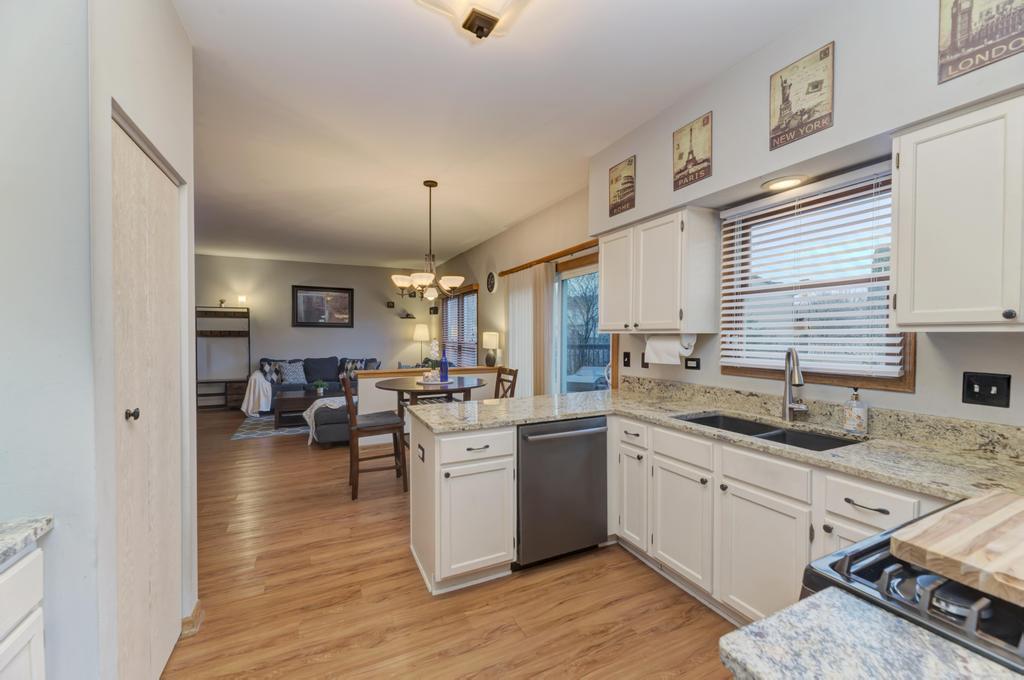 460 Springwood Lane Bolingbrook, IL 60440 - Photo 10 of 35 a kitchen with sink stove and cabinets