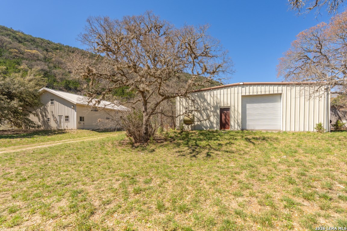 3655 North Seco Creek Road Medina, TX 78055 - Photo 12 of 45 a house view with a outdoor space