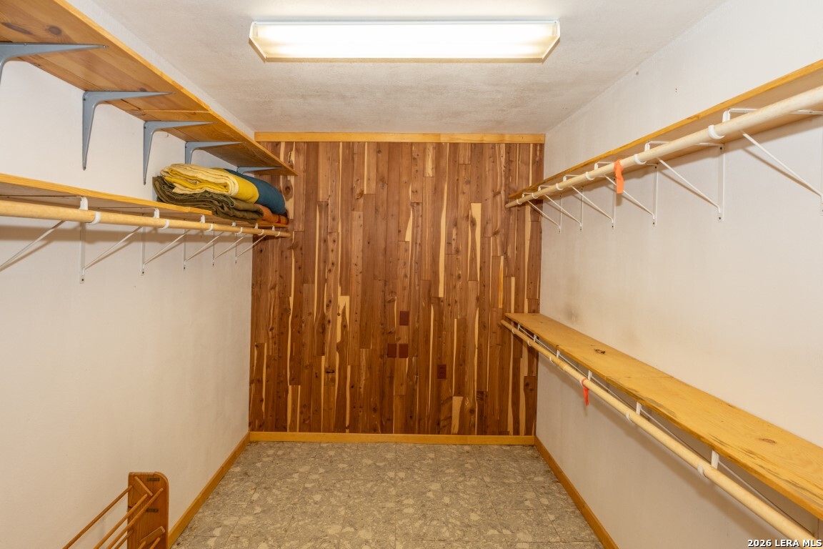 3655 North Seco Creek Road Medina, TX 78055 - Photo 21 of 45 a view of a room with wooden walls