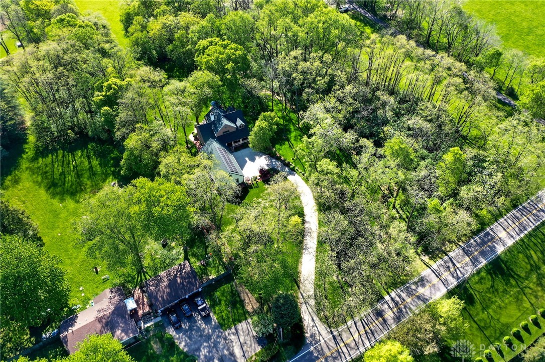 330 South Alpha Bellbrook Road Bellbrook, OH 45305 - Photo 71 of 87 Perched amidst lush greenery, this property offers serene, expansive natural surroundings and a private driveway.