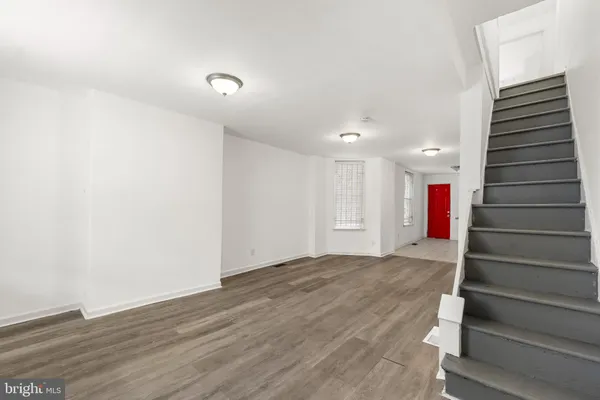 a view of entryway with wooden floor