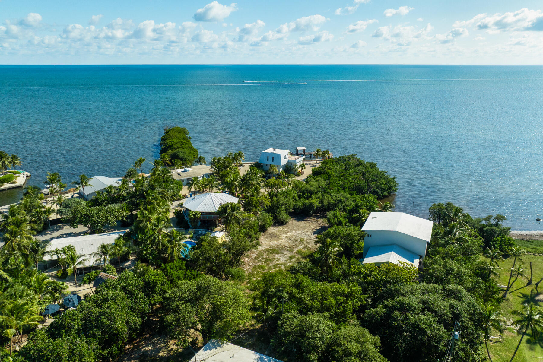 229 Coral Road Islamorada, FL 33036 - Photo 19 of 19 a view of a lake with a yard