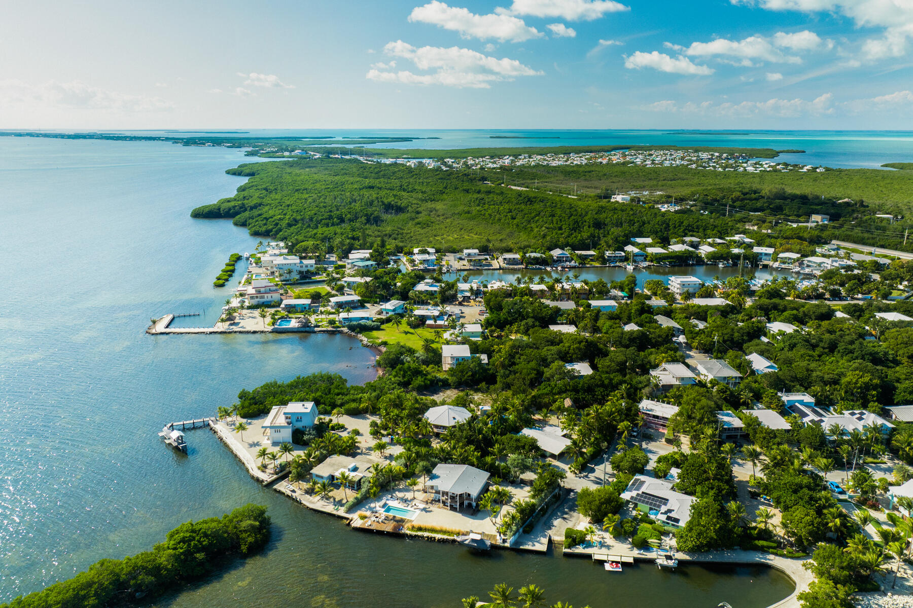 229 Coral Road Islamorada, FL 33036 - Photo 5 of 19 a view of a lake with houses