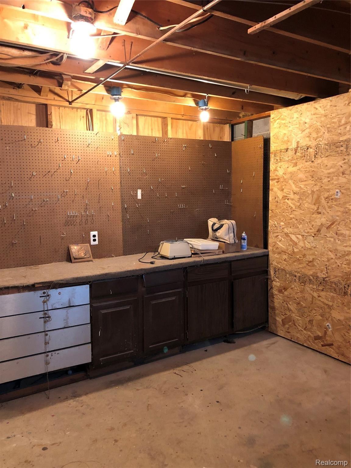 5208 Casey Road Dryden, MI 48428 - Photo 40 of 52 Workshop 1 in basement, cabinets are included in sale