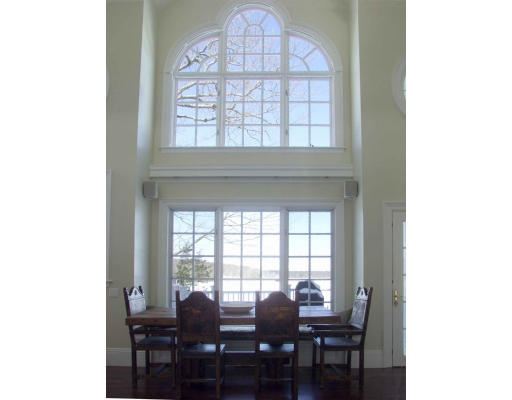 55 Sandy Pond Road Lincoln, MA 01773 - Photo 11 of 13 a view of a dining room with furniture and window
