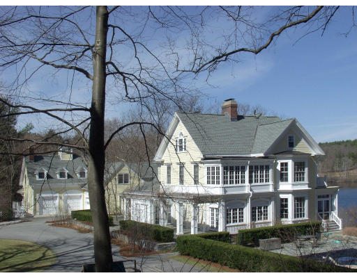 55 Sandy Pond Road Lincoln, MA 01773 - Photo 4 of 13 a front view of residential houses with yard