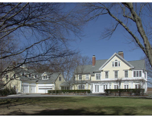 55 Sandy Pond Road Lincoln, MA 01773 - Photo 5 of 13 a front view of residential houses with yard
