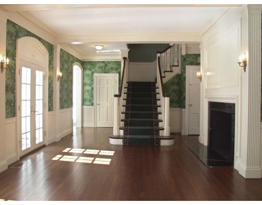 55 Sandy Pond Road Lincoln, MA 01773 - Photo 6 of 13 a view of empty room with wooden floor and fan