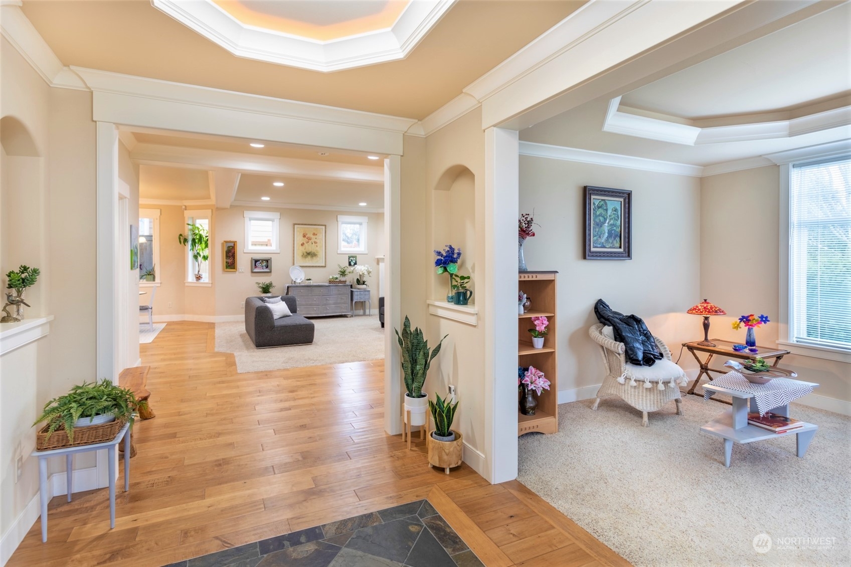 1301 North 34th Street Renton, WA 98056 - Photo 3 of 32 a living room with furniture and a wooden floor