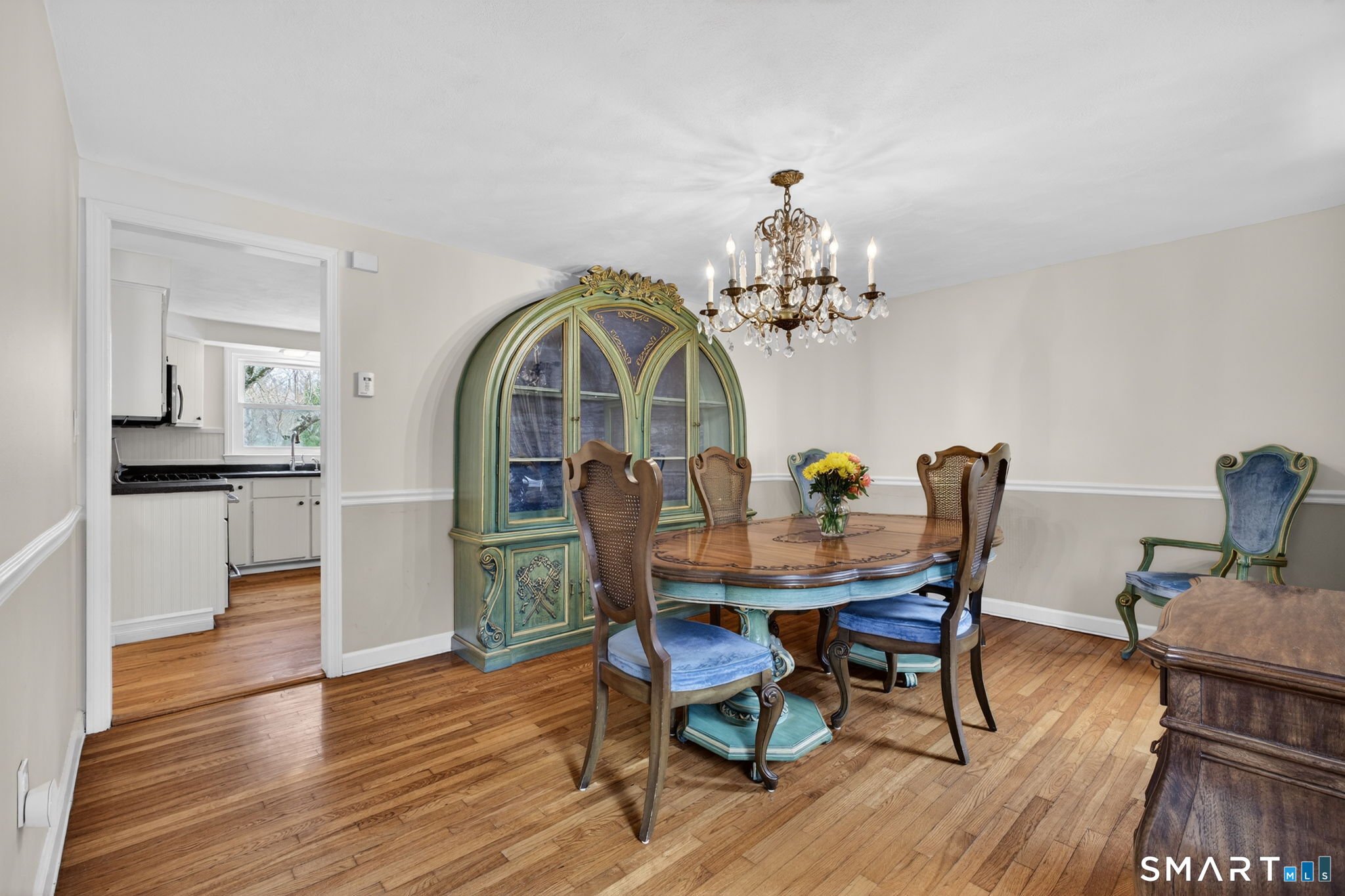 185 Ingham Hill Road Old Saybrook, CT 06475 - Photo 22 of 46 a view of a dining room with furniture and wooden floor
