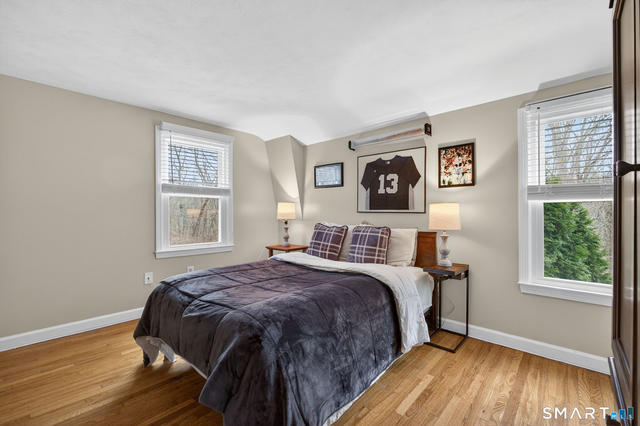 185 Ingham Hill Road Old Saybrook, CT 06475 - Photo 37 of 46 a bedroom with a bed and a window