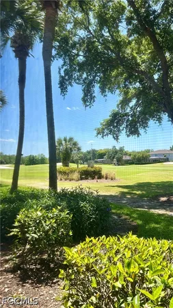 a view of a lake with a big yard