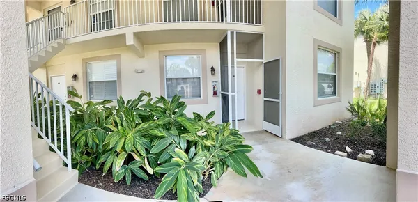 a view of a back yard of the house