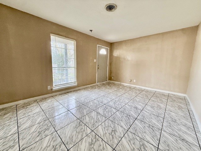 510 Roper Street Houston, TX 77034 - Photo 2 of 15 a view of an empty room and window