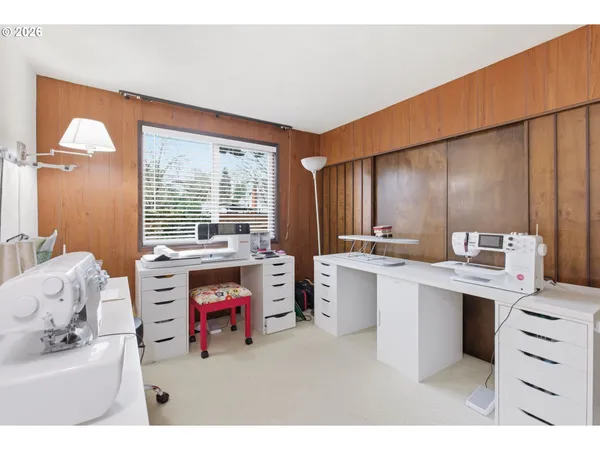 a utility room with cabinets a washer and dryer