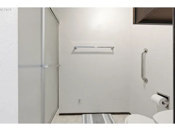 a en suite bathroom with a sink and a mirror
