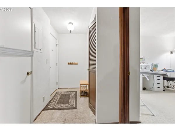 a view of room with a flat screen tv