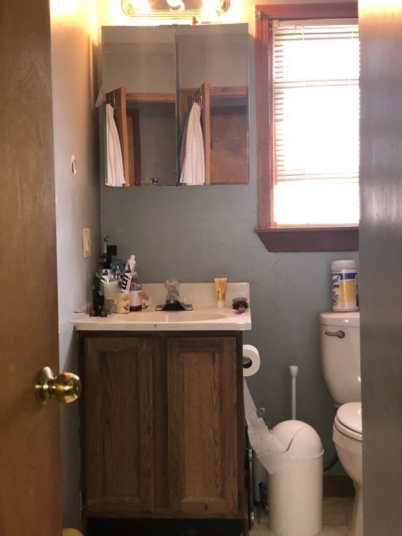 3 Havana Road Worcester, MA 01603 - Photo 12 of 21 a bathroom with a toilet sink and mirror