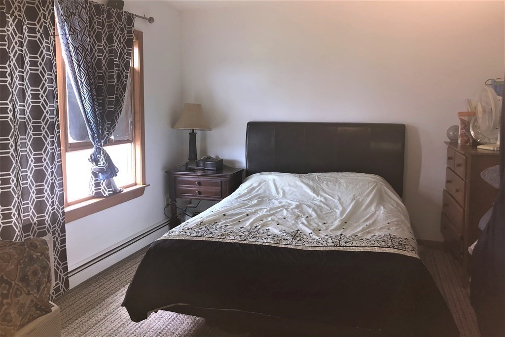 3 Havana Road Worcester, MA 01603 - Photo 13 of 21 a bed sitting in a bedroom next to a window