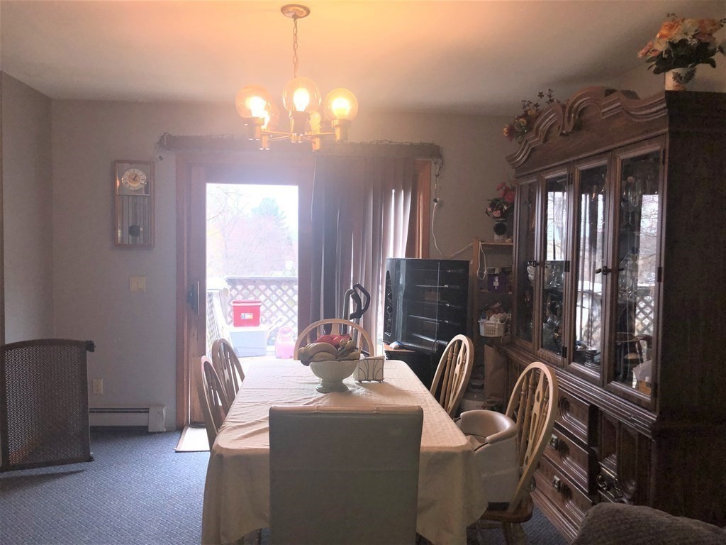 3 Havana Road Worcester, MA 01603 - Photo 5 of 21 a living room with furniture a lamp and a chandelier