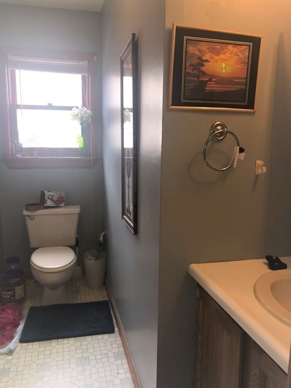 3 Havana Road Worcester, MA 01603 - Photo 7 of 21 a bathroom with a toilet a sink and mirror