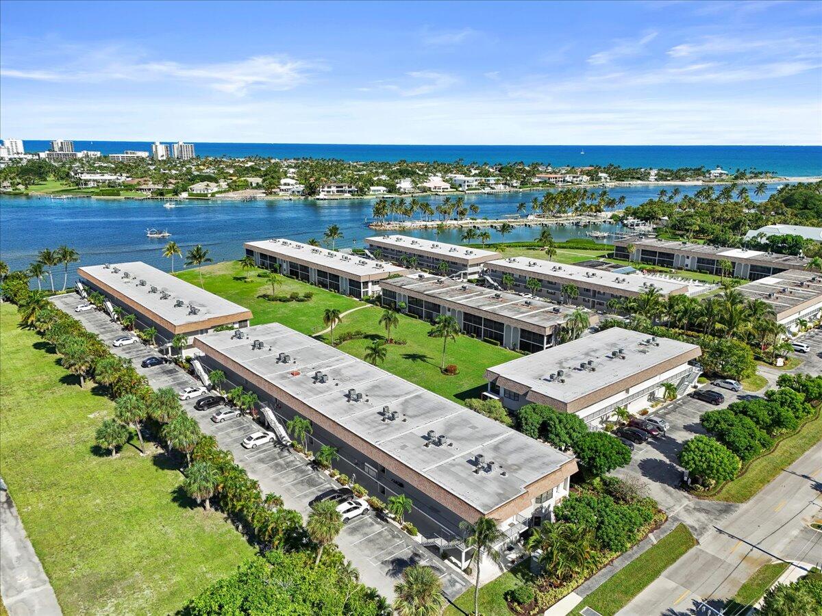 755 Saturn Street, Unit H101 Jupiter, FL 33477 - Photo 2 of 16 an aerial view of a city