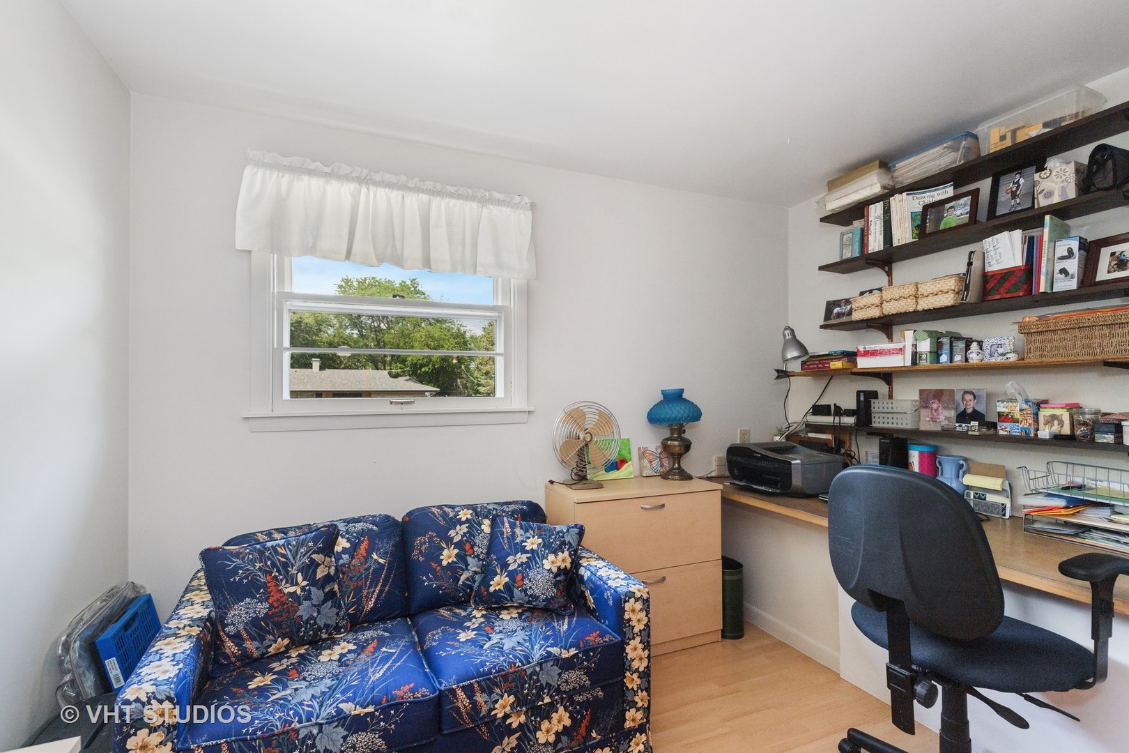 2107 Meadow Drive Lindenhurst, IL 60046 - Photo 11 of 18 a living room with furniture and a window