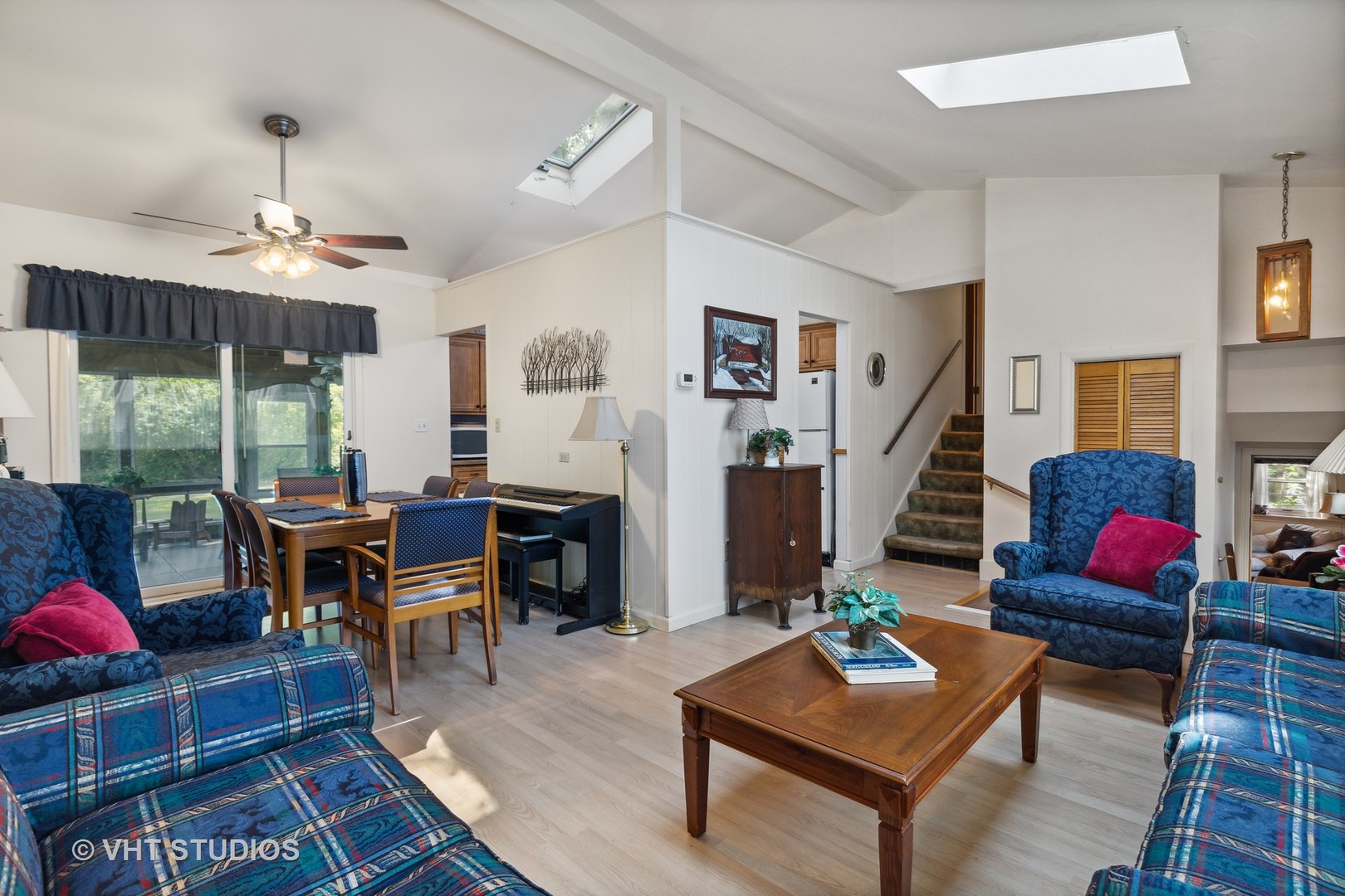 2107 Meadow Drive Lindenhurst, IL 60046 - Photo 3 of 18 a living room with furniture fireplace and a view of kitchen