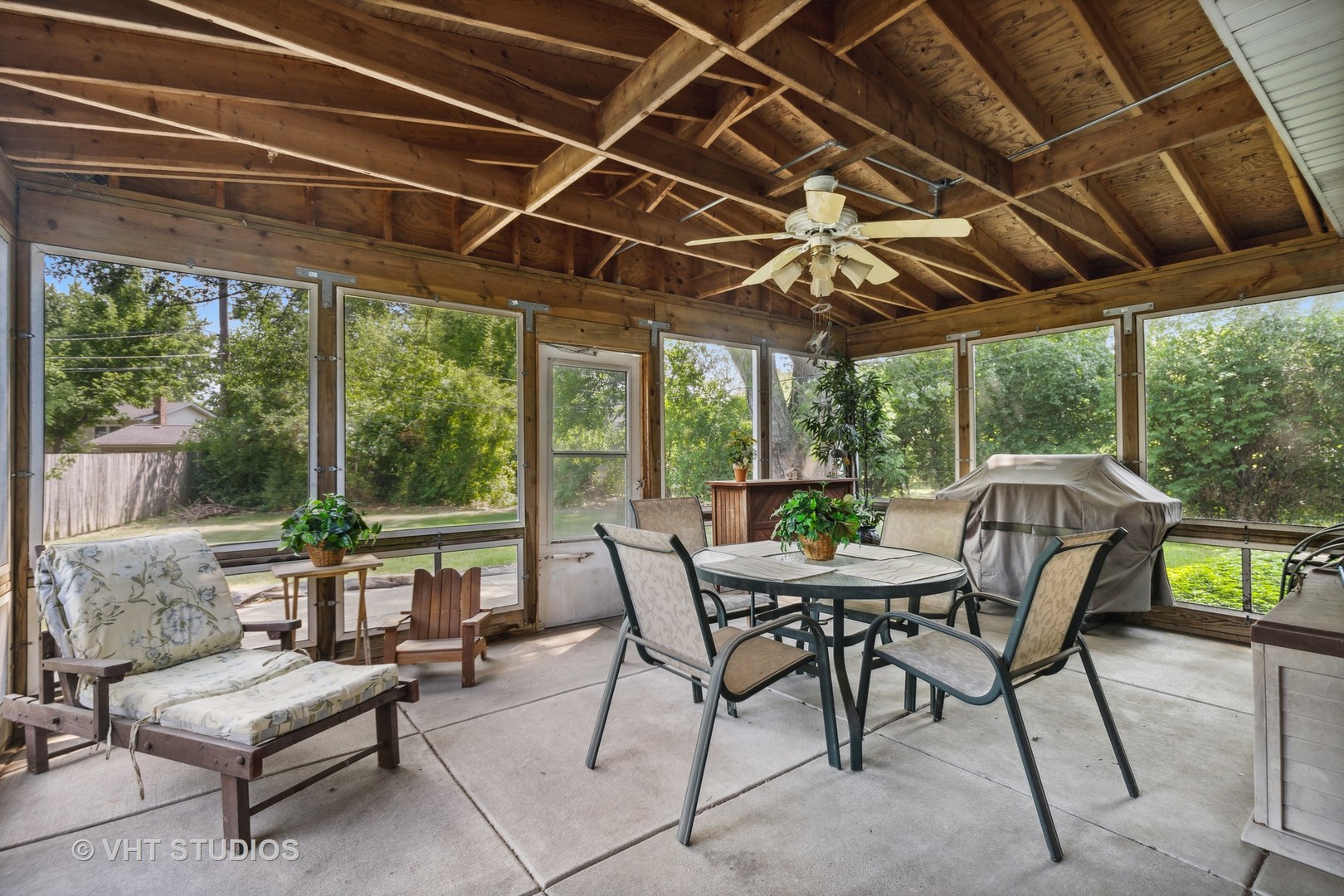 2107 Meadow Drive Lindenhurst, IL 60046 - Photo 8 of 18 a patio with yard glass top table and chairs