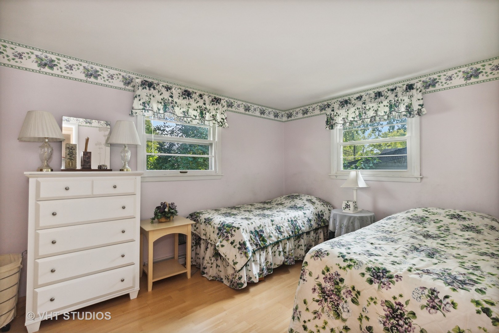2107 Meadow Drive Lindenhurst, IL 60046 - Photo 10 of 18 a bedroom with two beds and a dresser