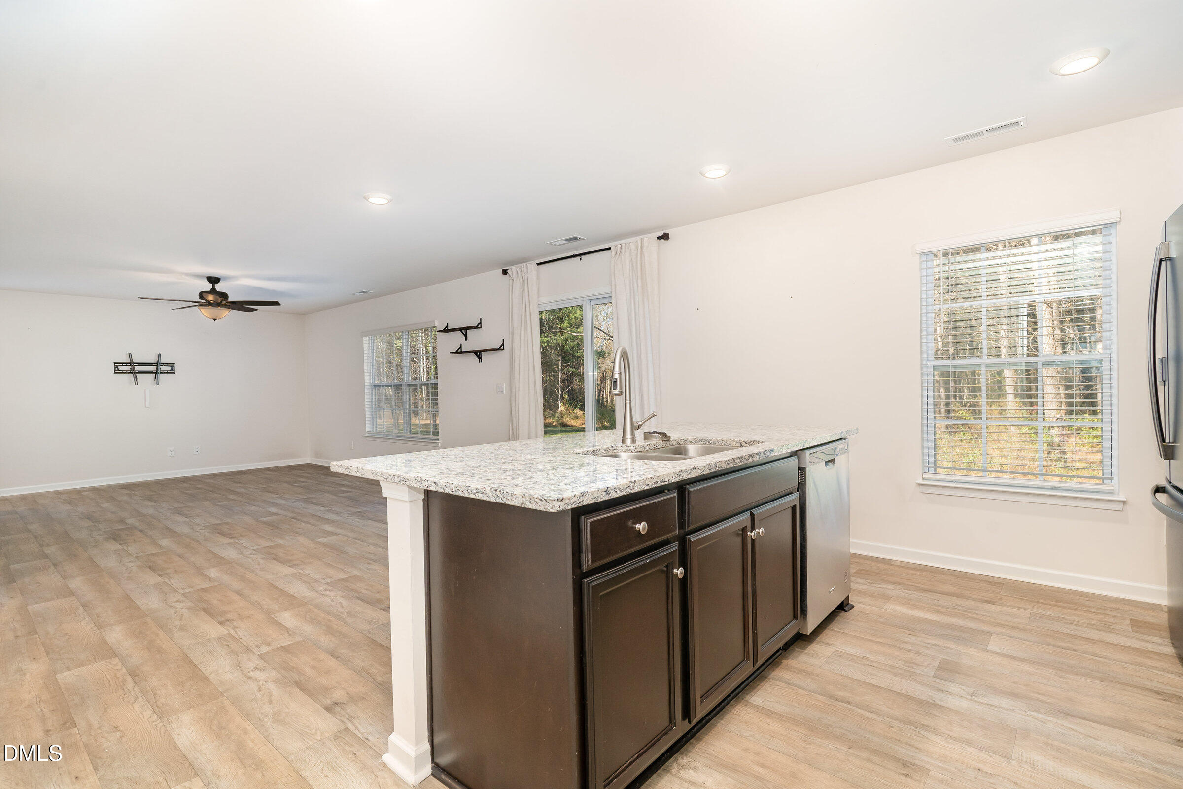 5496 Carolines Way Wilson, NC 27893 - Photo 18 of 71 a kitchen with a stove and a sink